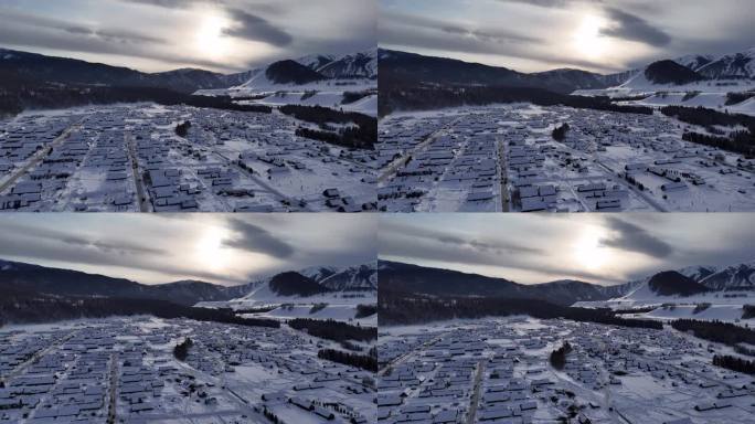 航拍新疆阿勒泰禾木冬天黄昏雪景