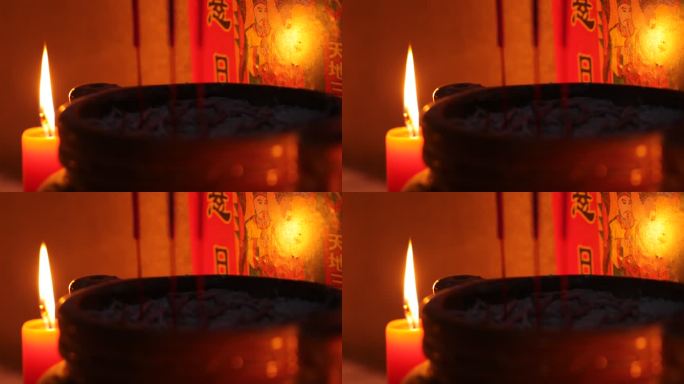 神龛前的香炉和红蜡烛