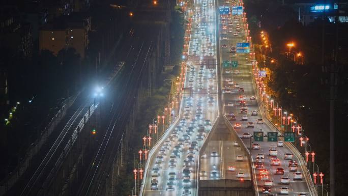 城市夜景街头马路行驶的汽车与车流