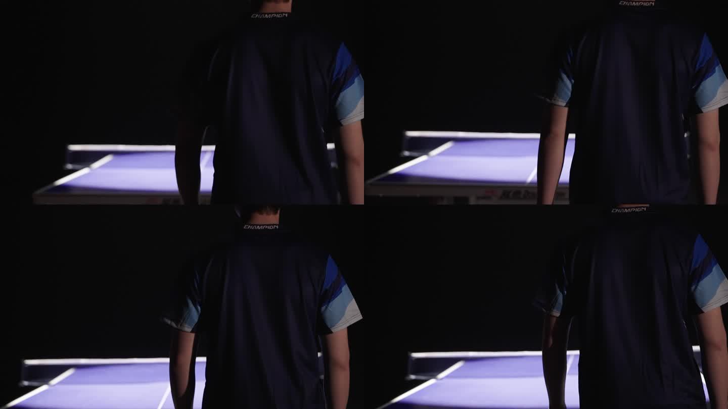 男人比赛上场面对乒乓球桌向前走坚定背影