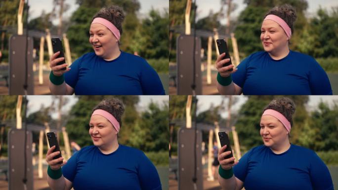 体型庞大的女性滚动智能手机应用程序，搜索街头健身提示