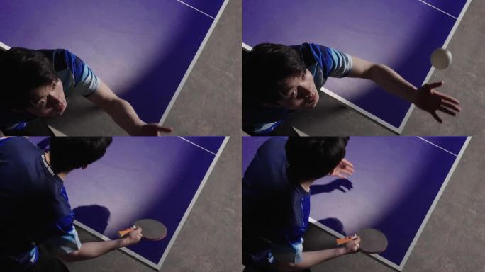 俯拍男人打乒乓球发球比赛训练
