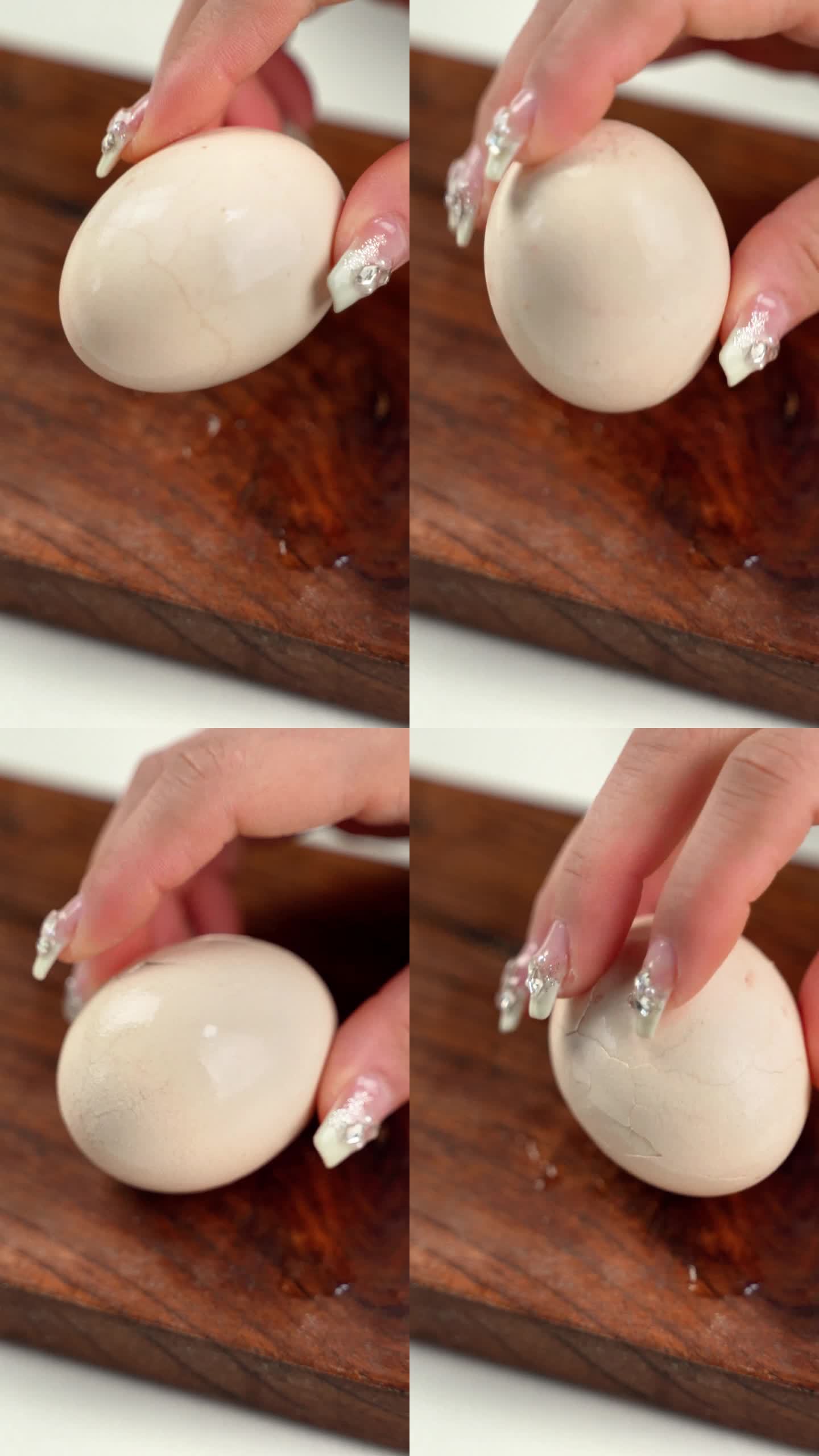 用手将煮熟的鸡蛋磕开