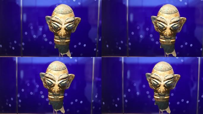 三星堆商代晚期金面具笄发青铜人头像