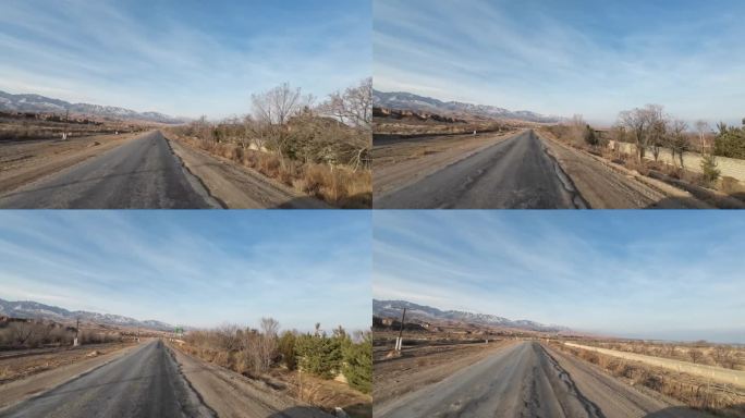 行驶在吉尔吉斯斯坦的乡村道路上，条件很差