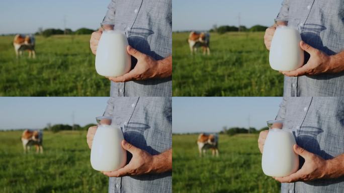 正面——一个男人在绿色的草地上拿着一罐牛奶
