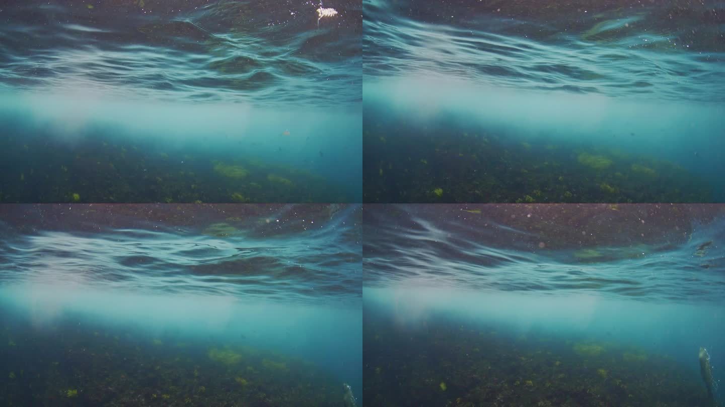 从水下看蓝绿色的波纹水面