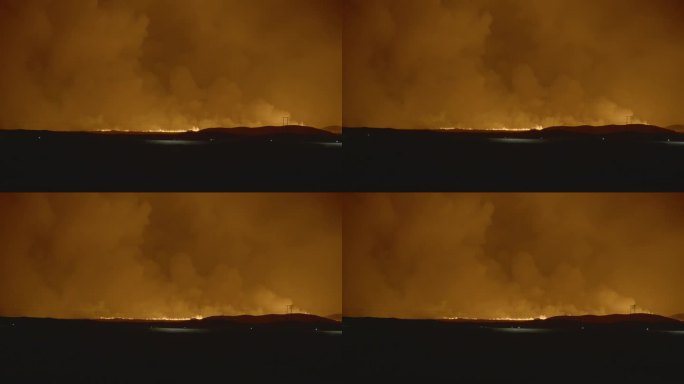 冰岛火山喷发后，熔岩和烟雾在地平线上形成的烟雾。
