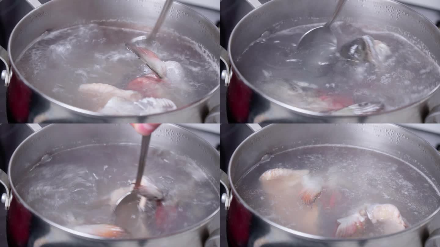 煮鱼汤鱼汤，鳟鱼，沸水特写。有选择性的重点
