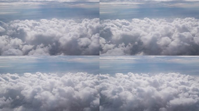 蓝天上的云，从飞机窗口看出去。