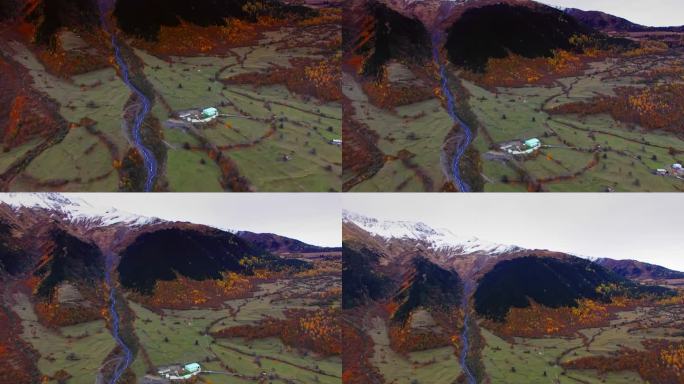 在秋天的一天，无人机拍摄了梅斯蒂亚附近雄伟的雪峰