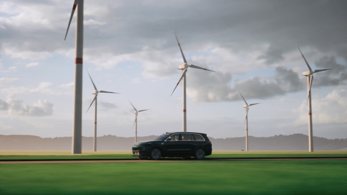 新能源车理想L9行驶在风力发电场