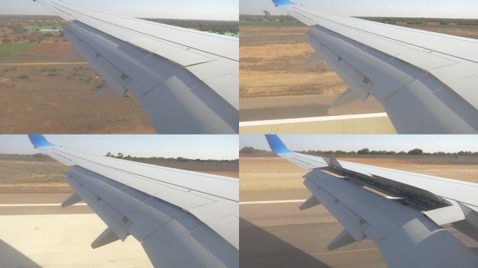 在一个阳光明媚的日子里，在摩洛哥阿加迪尔，飞机机翼展开襟翼着陆