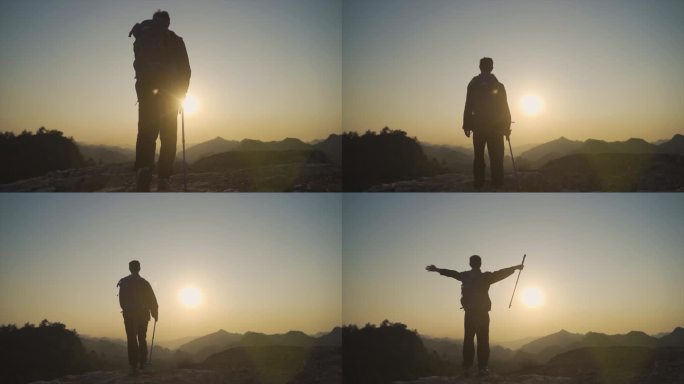 背着登山包男人山顶逆光行走背影走向山顶