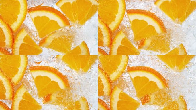 超级慢动作的新鲜橙子配上气泡水
