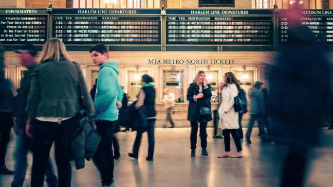 美国纽约市曼哈顿中城通勤铁路总站的乘客和游客步行和过境的4K镜头