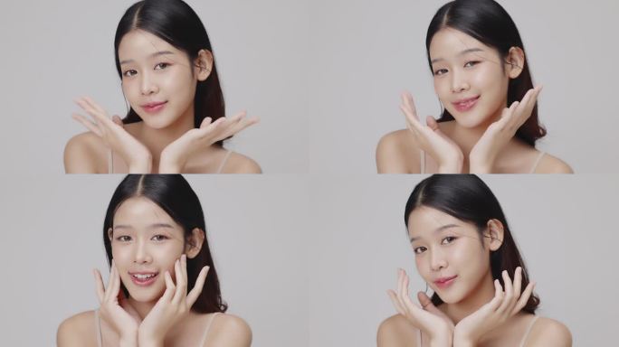 肖像美丽的年轻亚洲女性与健康的面部皮肤轻轻触摸脸。