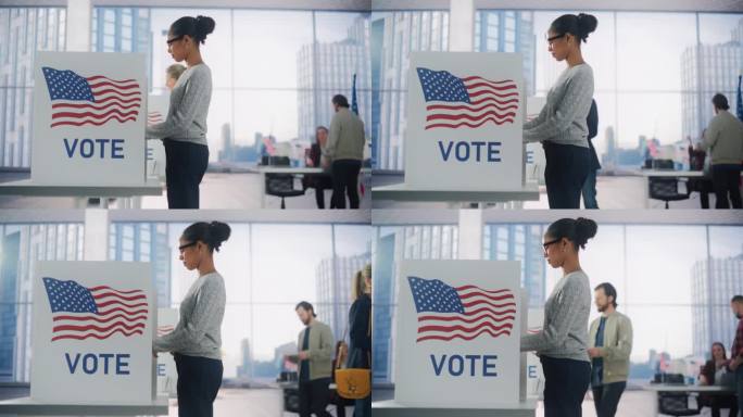 美国选举日，年轻的非洲裔美国妇女在投票站旁填写选票。不同的男人和女人在投票站为总统候选人投票