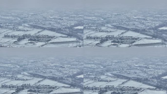 航拍小镇城市平原建筑学校民房城镇农村雪景