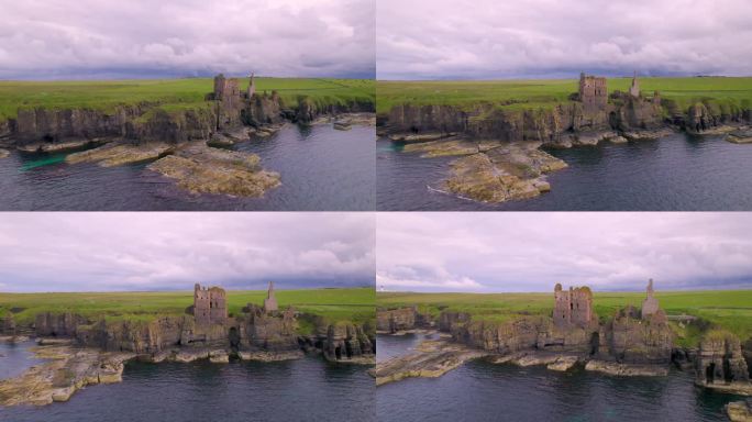 航拍:壮丽的悬崖海岸和古老的辛克莱城堡遗址