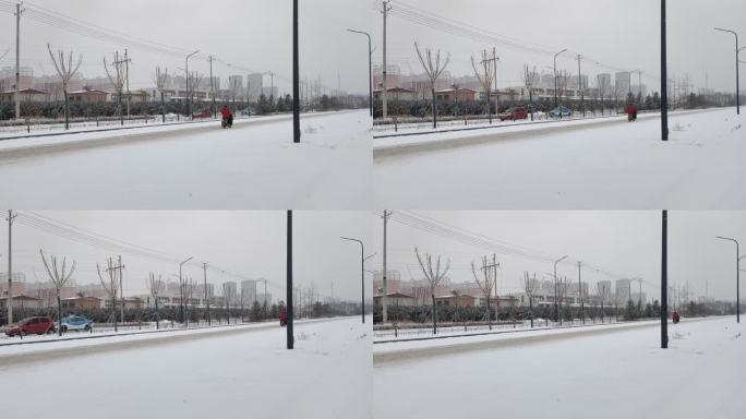 道路湿滑 下雪 电动车 出行 寒冷