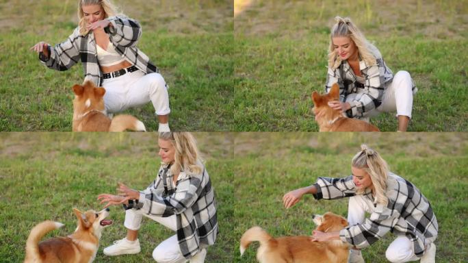 一名女子和一只威尔士柯基犬玩耍，在散步时抚摸它，用爱的眼神看着它，一起玩得很开心。Childfree