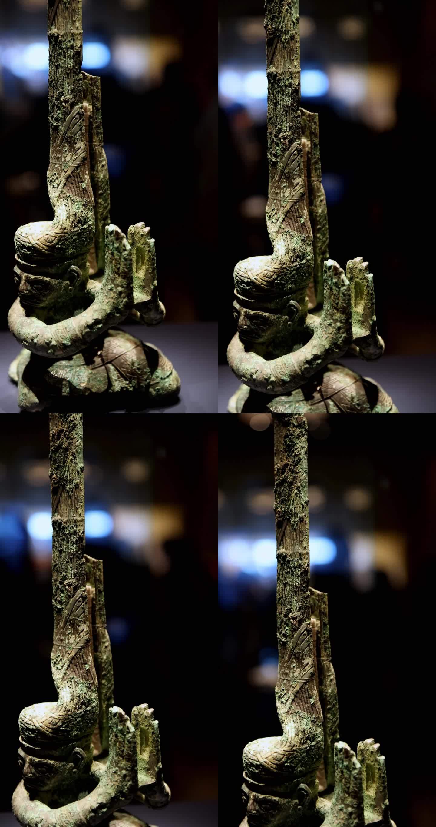 三星堆青铜人商代晚期长发青铜跪坐人像