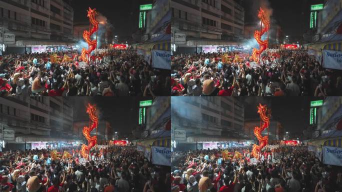 一群人在社交媒体上拍摄中国春节期间的舞龙表演视频。