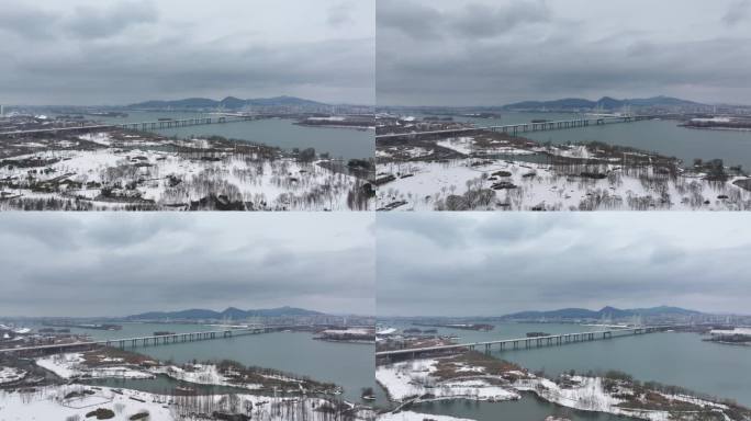 航拍襄阳汉江月亮湾公园冬天雪景自然风光