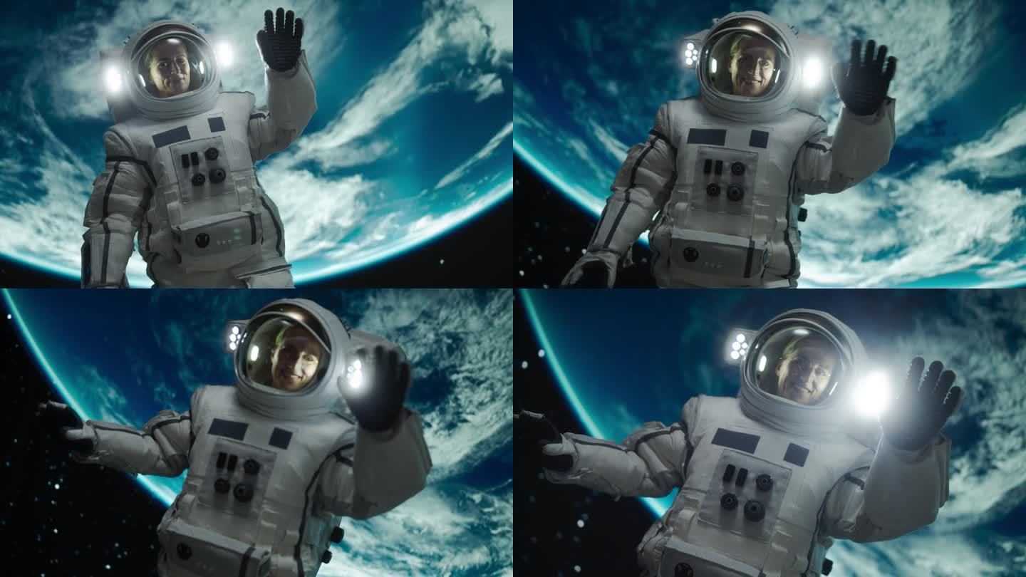 一个强壮的女宇航员的肖像漂浮在宇宙飞船外，背景是地球。女人对着镜头挥手。职业女宇航员穿着太空服，微笑