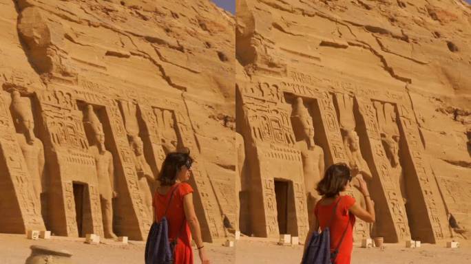 在埃及南部努比亚的纳赛尔湖畔，一名身穿红色连衣裙的年轻女子走向纳菲尔塔里神庙，神庙旁边是阿布辛贝神庙