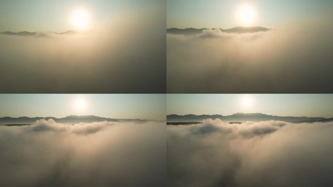 云雾在天空中移动，日出与山