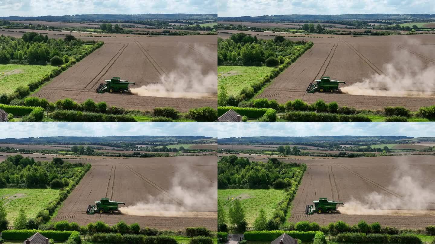 无人机拍摄的收割小麦的画面