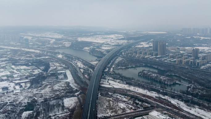 西安绕城高速雁鸣湖段雪天延时航拍