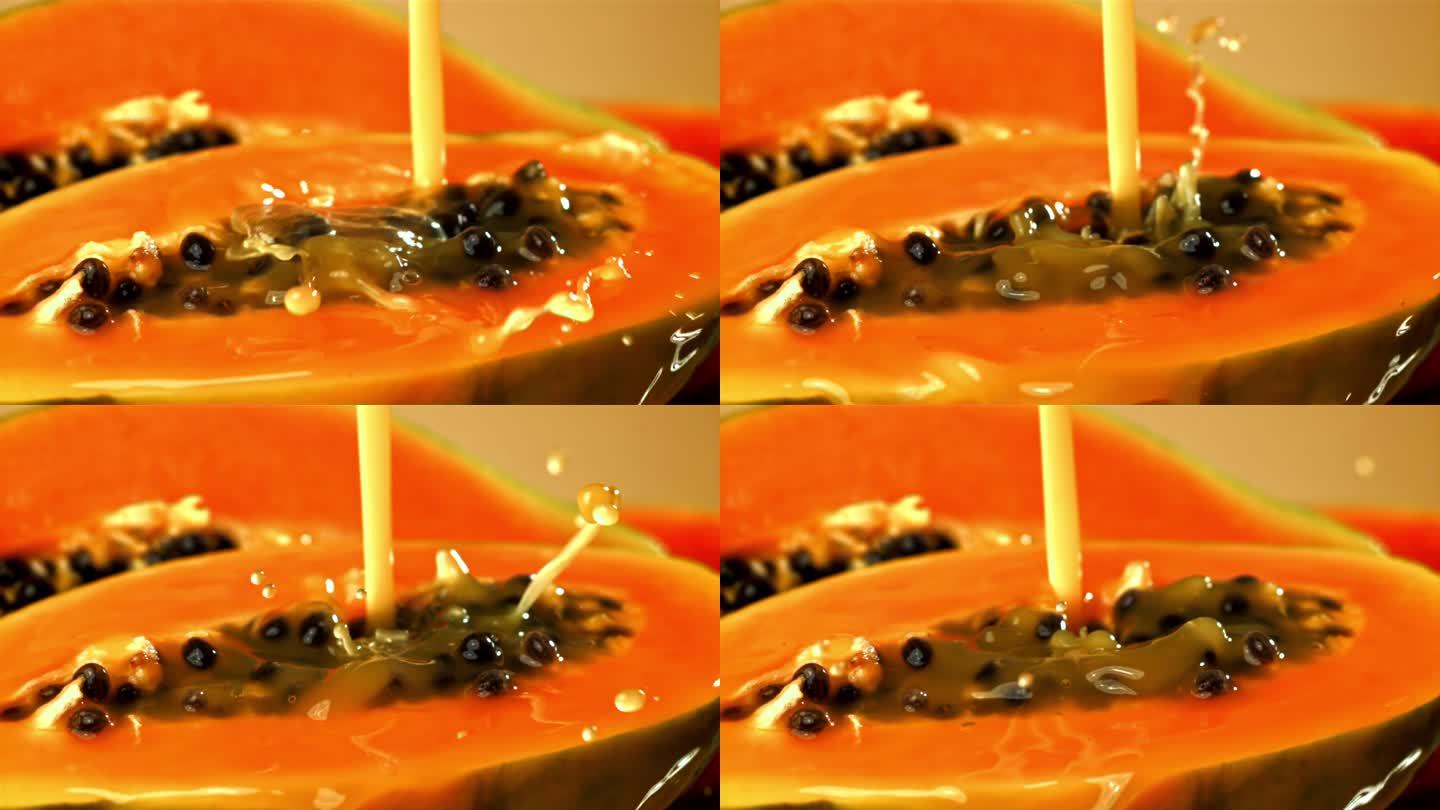 新鲜木瓜加一点果汁。用高速摄像机拍摄，每秒1000帧。