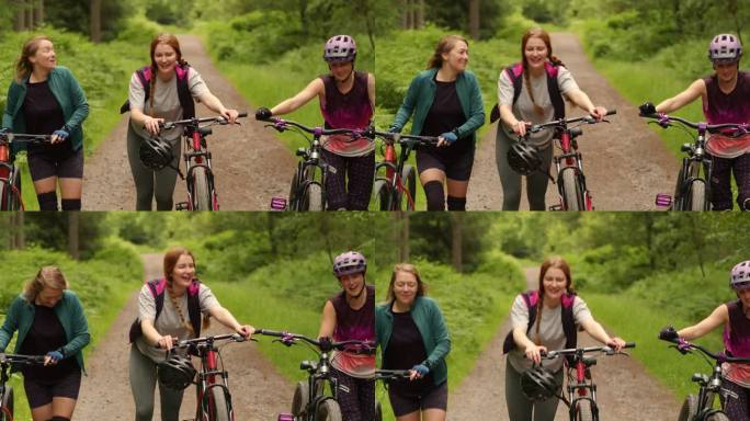 把自行车推向顶峰三个外国女人骑车登山运动
