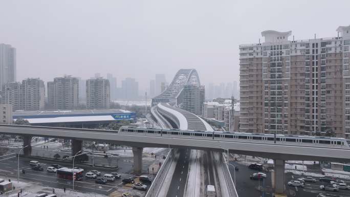 4k航拍武汉汉口古田四路地铁一号线雪景