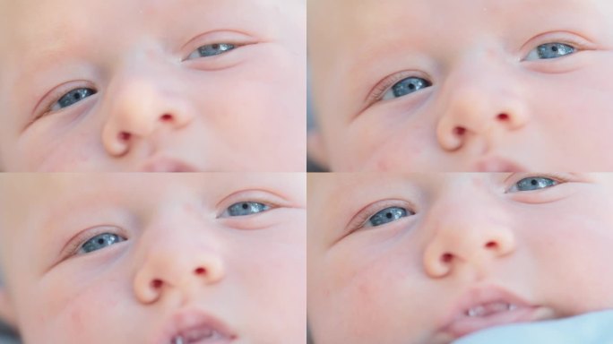 超级特写全画幅拍摄可爱的婴儿男孩的脸与蓝眼睛