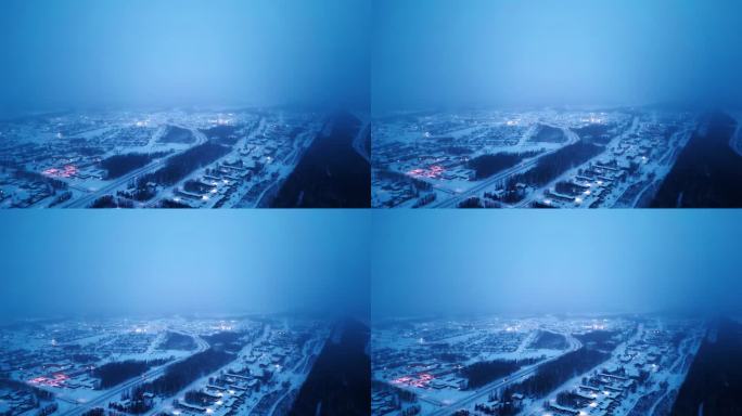 高空4K日出蓝色小时早晨电影4K暴雪降雪大雾发光无人机拍摄北极冬季社区孤立的努纳武特矿业村中心北汤普