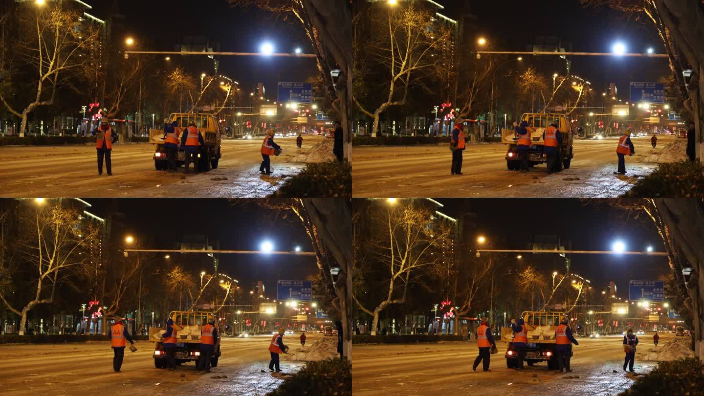 道路上融雪的工作人员和车辆