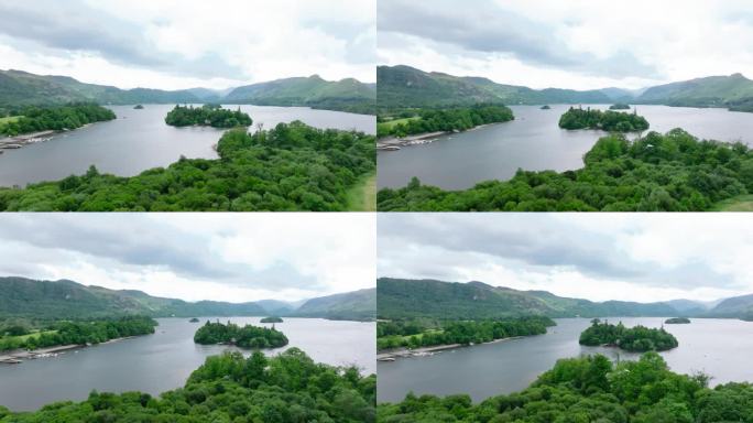 鸟瞰日落时分美丽的大湖和岛屿(德文特湖，英格兰湖区)