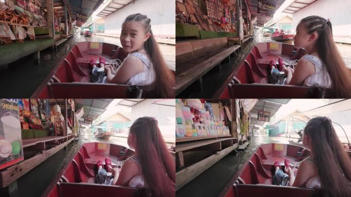 图为，亚洲游客正在丹门沙都水上市场游玩