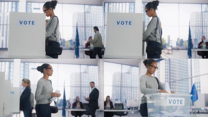 年轻时尚的非洲女性在投票站投票。黑人妇女将选票投进密封的投票箱。不同的人在欧盟民主选举中投票