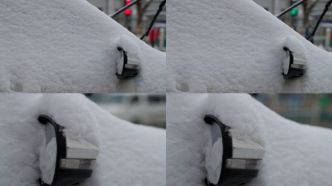 大雪覆盖轿车