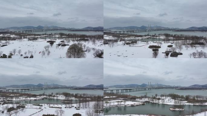 航拍襄阳汉江月亮湾公园冬天雪景自然风光