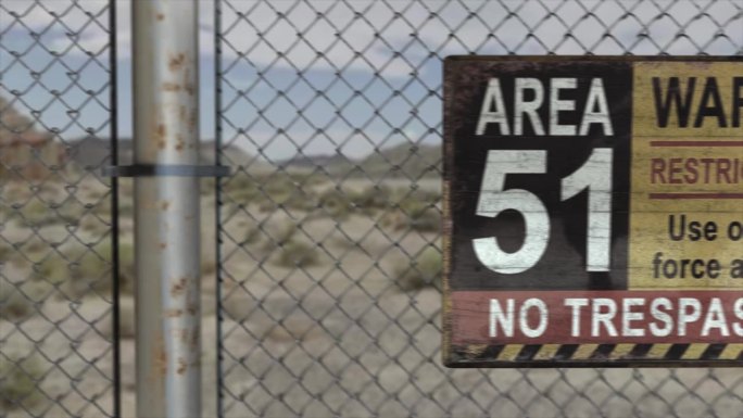 高质量的3D CGI渲染在沙漠场景中的一个秘密军事设施的铁链围栏，带有51区警告禁区标志，