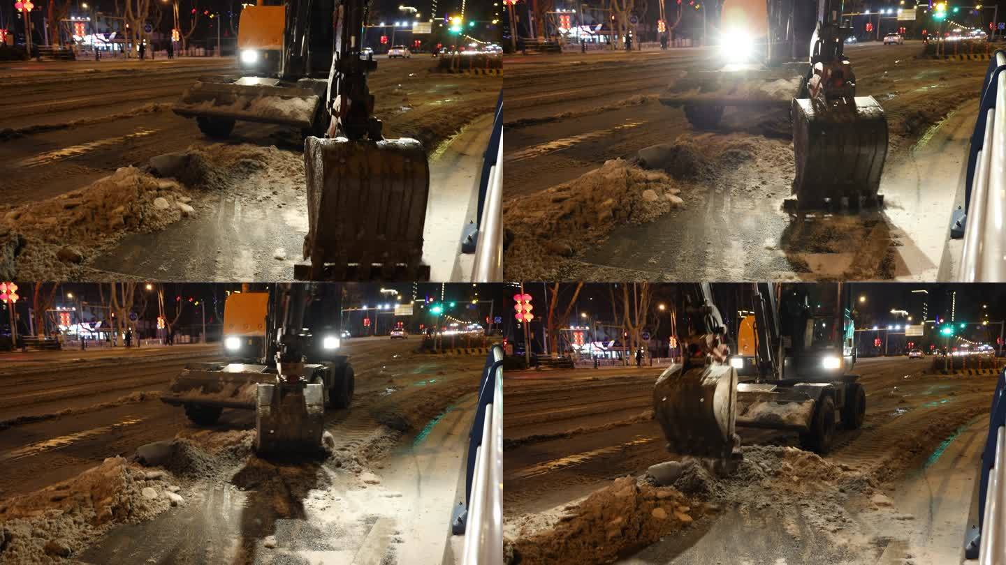 夜晚挖机在道路上除雪除冰02