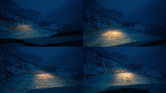 夜间的道路很可怕，山上有大雪。汽车在危险道路上行驶的镜头。冬季路况极端。夜间湿滑的雪地公路。冬天在山