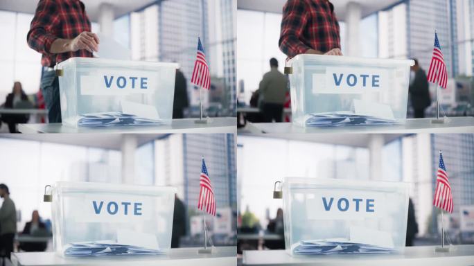 民主在行动:在一个现代投票站，成年白人男子把他的选票放进一个密封的盒子里。美国人民在美国选举日行使公