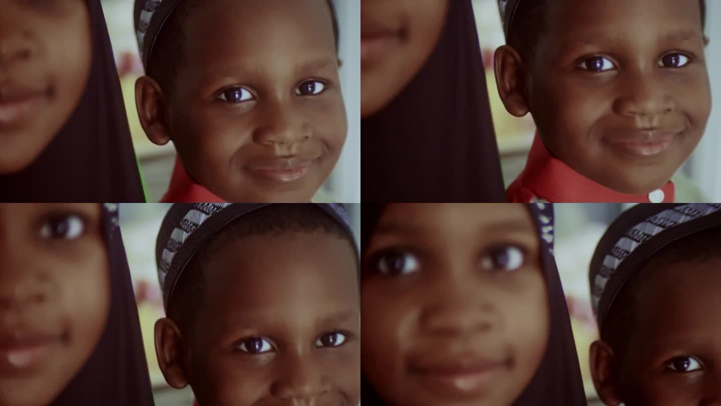看着相机的孩子两个外国人非洲亲子开心笑容